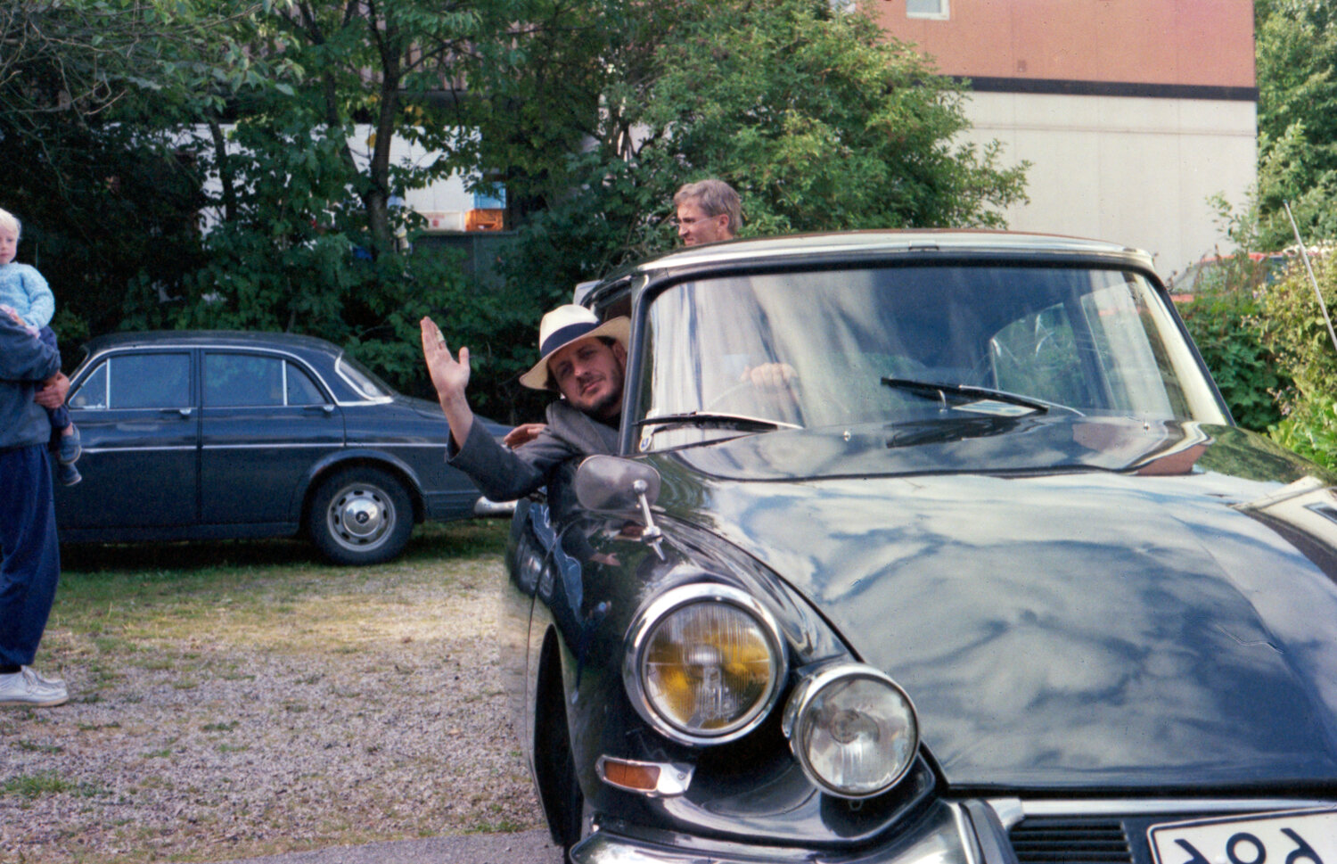 Anders Waernebo Garnow leaning out of a Citroën DS, waving