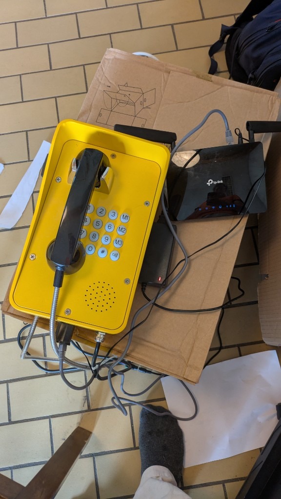 Yellow phone and router