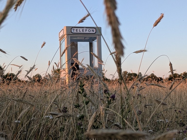 LINJEN — phone booth in a field